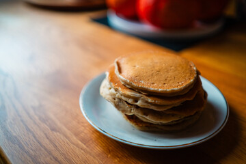 Stack of Pancakes on a Wooden Table 