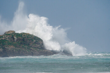 Fototapeta na wymiar Mouro Island Lighthouse with strong waves
