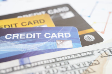 Obraz premium Credit card with password key lock and US dollar banknote money, security finance business concept.