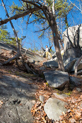 A chinese woman on the whitestone cliffs trail in plymouth connecticut