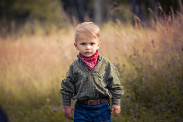 Little Cute Boy in Western Costume