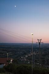Landscape with light pole and electricity post