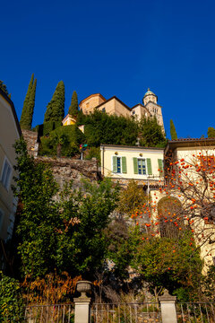 Church Santa Maria del Sasso Against Blue Clear Sky on Mountain in a Sunny Day in Morcote, Ticino in Switzerland.