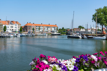 A colorful view from the Spijkerbrug in Middelburg of the Buitenhaven and homes along the Havendijk