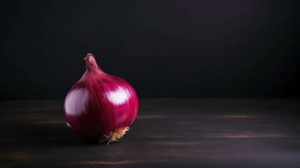Fresh onions on a black background. Spices, herbs. Healthy food. Free space for your text