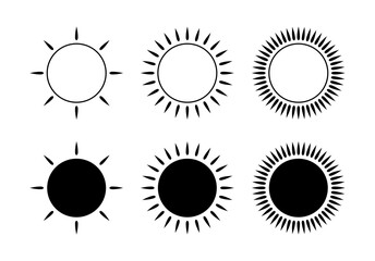 Set of abstract sun icons. A symbol of warmth and light. Stylized sun with rays. 