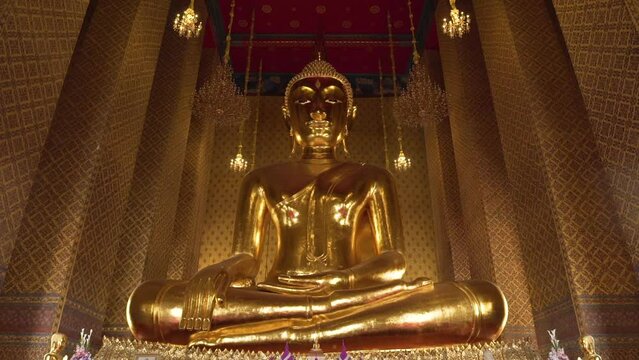 Phra Buddha Trirattananayok or Luang Pho To Golden Buddha statue in the ordination hall of Kalayanamit Woramahaviharn Temple.