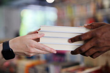 Pass a book from hand to hand, reflecting a thoughtful and selective approach to education and...