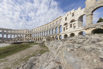 Obraz premium View inside the Roman amphitheater in the Croatian city of Pula without people