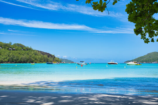  Sunny, white sandy beach, turquoise water at port glaud beach, Mahe, Seychelles. 5