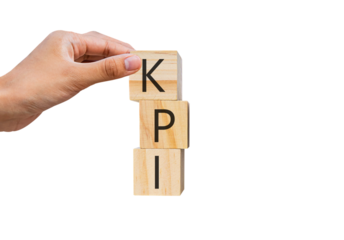 Wooden cube with KPI text isolated on white background. Business ideas to goals.PNG