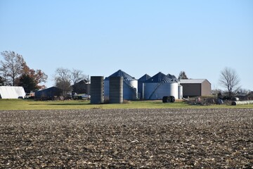 Grain Bins and Barns in a Farm Field