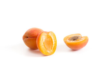 Apricot fruit whole and half isolated on white background..