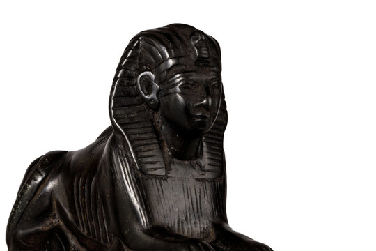 Black stone sphinx statue isolated on white background.