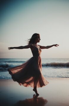 Fototapeta giovane affascinante ballerina che danza al tramonto su una spiaggia deserta