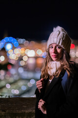 Fototapeta premium Portrait of a young woman face in the cold at Christmas.