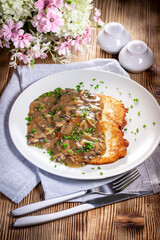 Crispy potato pancakes with mushroom sauce