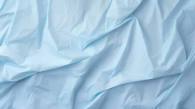 crumpled light blue paper background