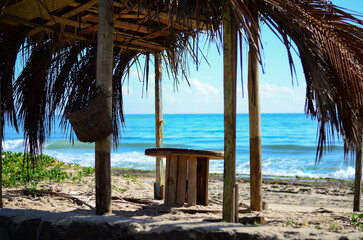 Rustic beach hut in a beautiful and calm day