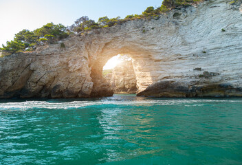 view from the boat of the famous rock caves of the Gargano coast