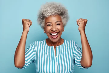 Papier Peint photo Lavable Vielles portes Elderly exultant overjoyed jubilant African American woman 50s years old wear light striped shirt look camera spread hands say wow isolated on plain pastel blue cyan color background studio