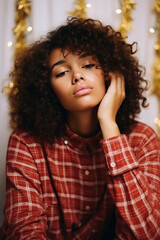 Spending at home young African American girl brown bob hair hands head chilling attractive person pretty dreams enjoying Christmas time isolated indoors