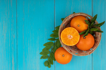 Top view fresh sliced orange on dark background ripe mellow fruit juice color citrus tree citrus, Whole and sliced ripe oranges placed on marble background, half orange fruit.