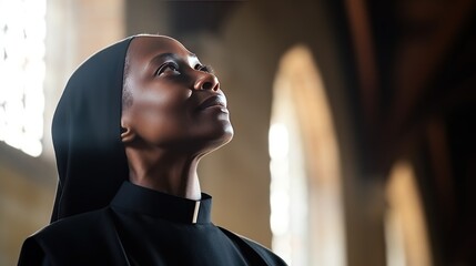 Middle aged African American nun praying - obrazy, fototapety, plakaty