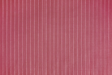 Obraz premium Striped red white fabric texture background wtih copy space. Shirt fabric, tablecloth textile, garment cloth, upholstery with classic pattern with lines. Backdrop, wallpaper, background.