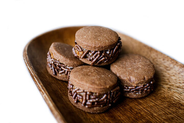 group of biscuits on wooden board. isolated on white background