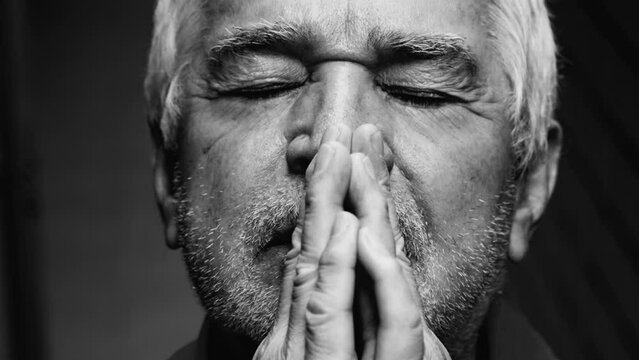 Dramatic Black and White of Spiritual Elderly Man Looking Skyward in Prayer for Guidance