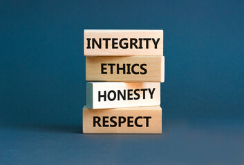 Integrity ethics honesty respect symbol. Concept word Integrity Ethics Honesty Respect on block. Beautiful grey background. Business integrity ethics honesty respect concept.