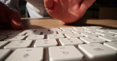 Female hands on computer keyboard typing text