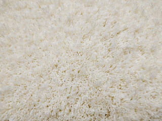 A fluffy beautiful carpet. Copy space. Flat lay, top view.