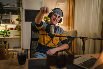 man shooting or streaming video podcast or vlogg blogger at studio