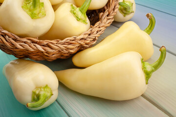white pepper on wood background