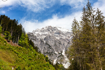 Mountain landscape with majestic peaks, lush greenery. Nature photography. Scenic, outdoors,...
