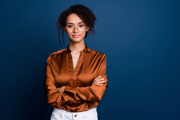 Photo portrait of attractive young woman folded hands confident wear trendy brown satin formalwear isolated on dark blue color background