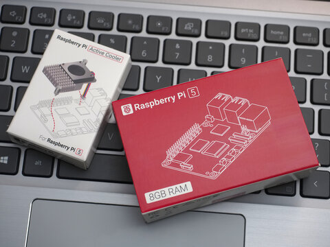 Galati, ROMANIA - November 10, 2023: Close-up of a Raspberry Pi 5 on a laptop keyboard. The Raspberry Pi is a credit-card-sized single-board computer developed in the UK