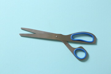 scissors on blue background