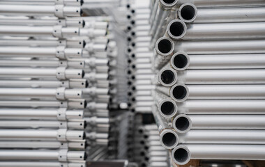 Aluminium scaffolding parts stacked in the pile in construction yard