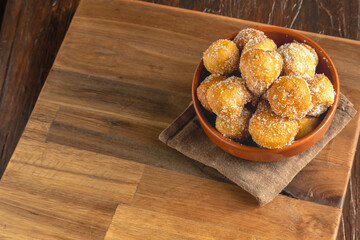 Fried fritters covered in sugar. Typical of Argentine homemade pastries.