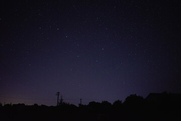 Beautiful landscape of Milky Way in the village during Starfall