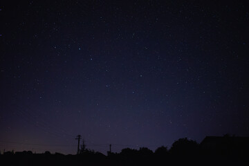 Beautiful landscape of Milky Way in the village during Starfall