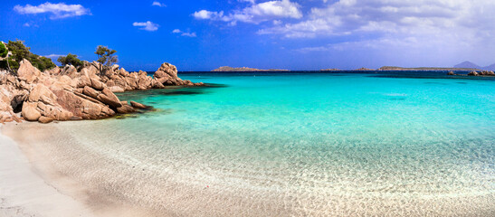 Italy summer holidyas . Sardegna island - stunning Emerald coast (Costa Smeralda) with beautiful beaches. popular Capriccioli beach with turquoise sea