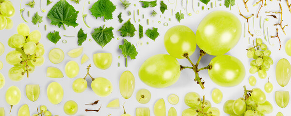 Abstract background made of Green Grape fruit pieces, slices and leaves isolated on gray background.