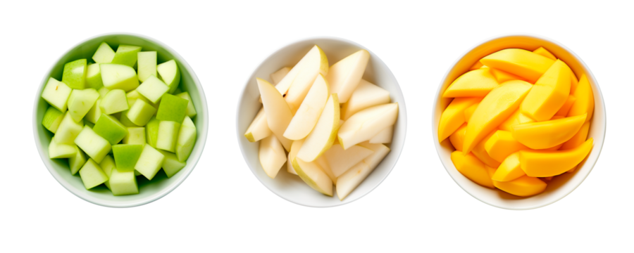 High angle view of chopped green apple, pears and mango over isolated transparent background