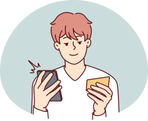 Happy man paying on cell with credit card