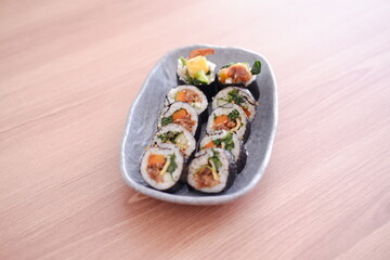 Sushi roll japanese food style on wooden table background.