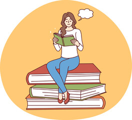 Happy woman sit on pile reading book